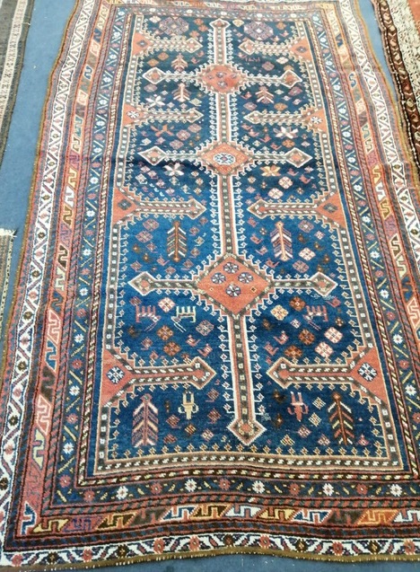 A Tabriz blue ground carpet 235 x 141cm